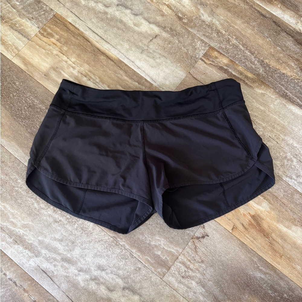 Size 6 Lululemon Athletica Black Athletic Shorts with Curved Hem